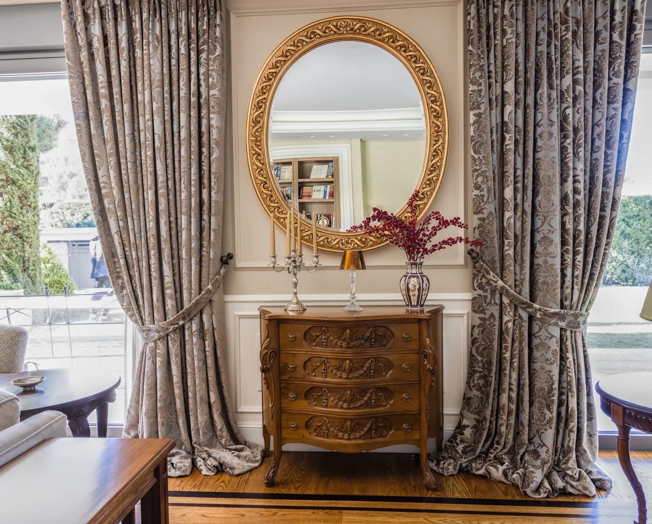 Carved Chest of Drawers with Gilded Oval Mirror
